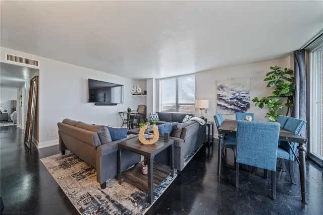 a view of a livingroom with furniture and a rug