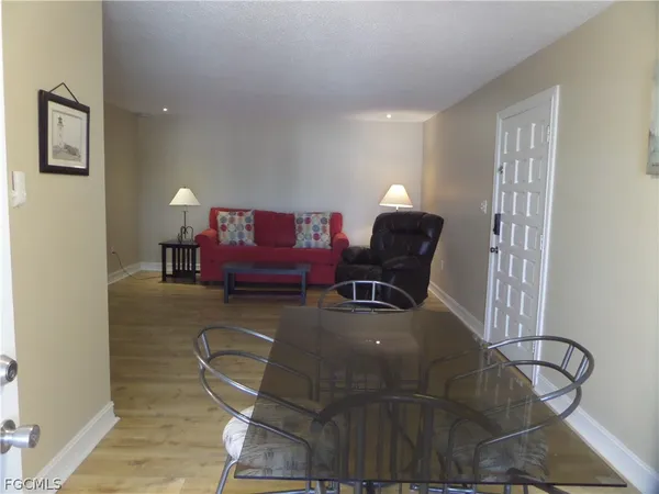 a living room with furniture and a couch