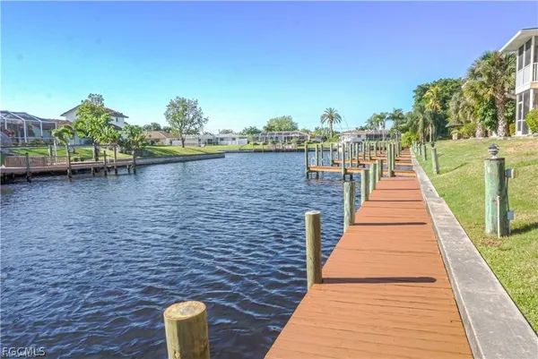 a view of balcony with wooden floor