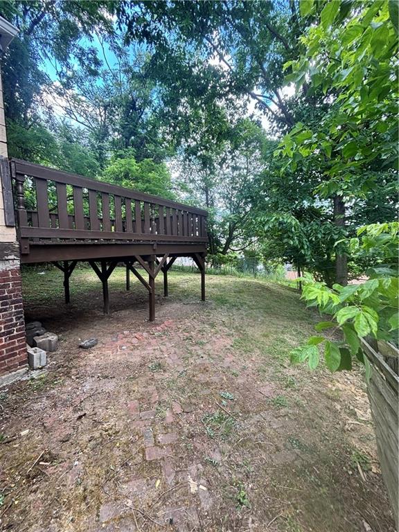 335 Cedarhurst Street Pittsburgh, PA 15210 - Photo 28 of 28 a view of backyard with table and chairs