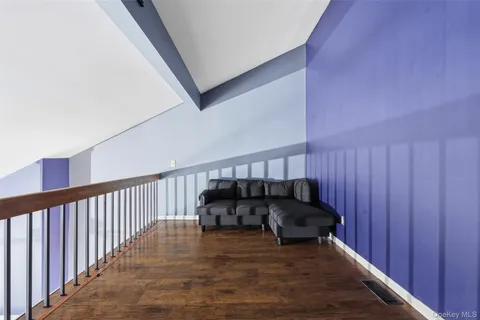 a view of deck with wooden floor and outdoor seating