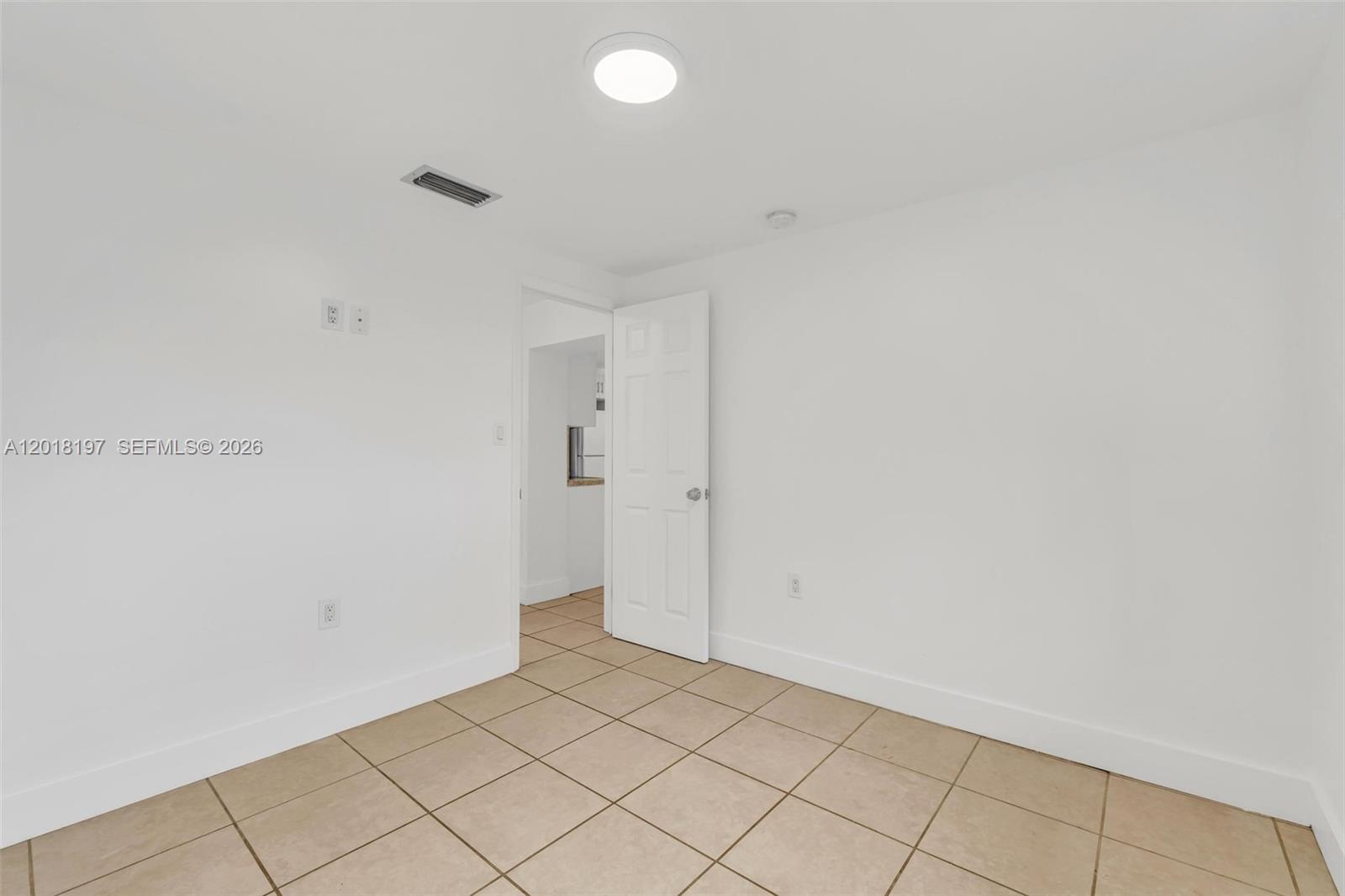 628 Southwest 8th Avenue Homestead, FL 33030 - Photo 22 of 25 a view of an empty room