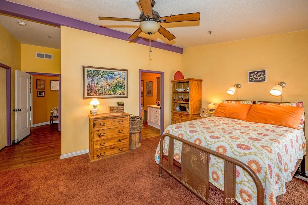 33330 Palen Road Agua Dulce, CA 91390 - Photo 7 of 56 a bedroom with a bed and a dresser