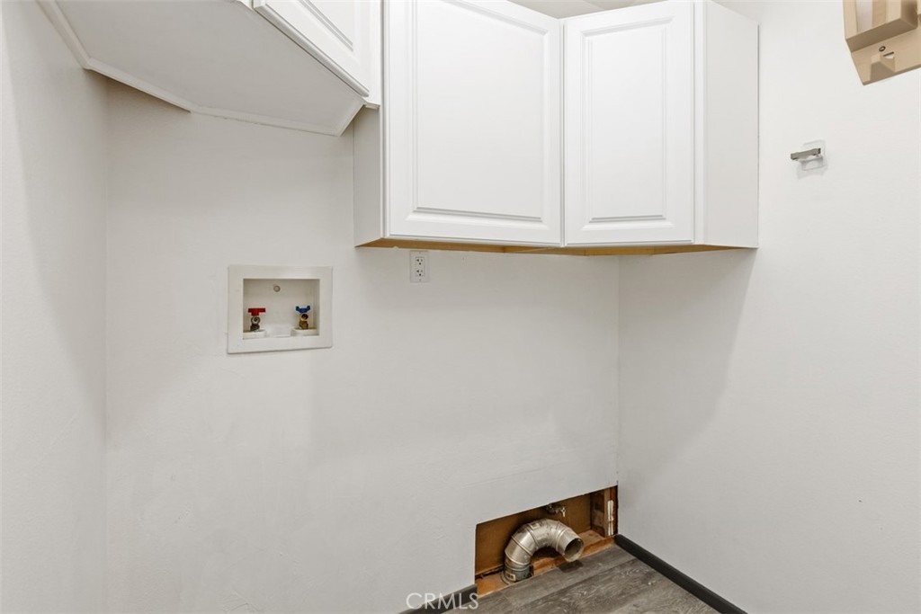 1321 Pepper Tree Lane Vista, CA 92084 - Photo 24 of 63 Laundry room