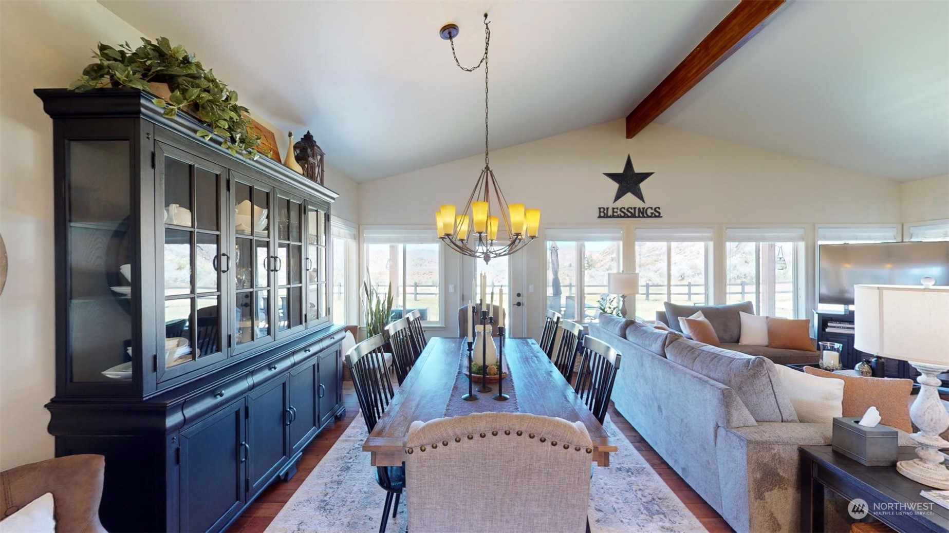 192 Hubbard Road Riverside, WA 98849 - Photo 14 of 40 a living room with furniture chandelier and flat screen tv