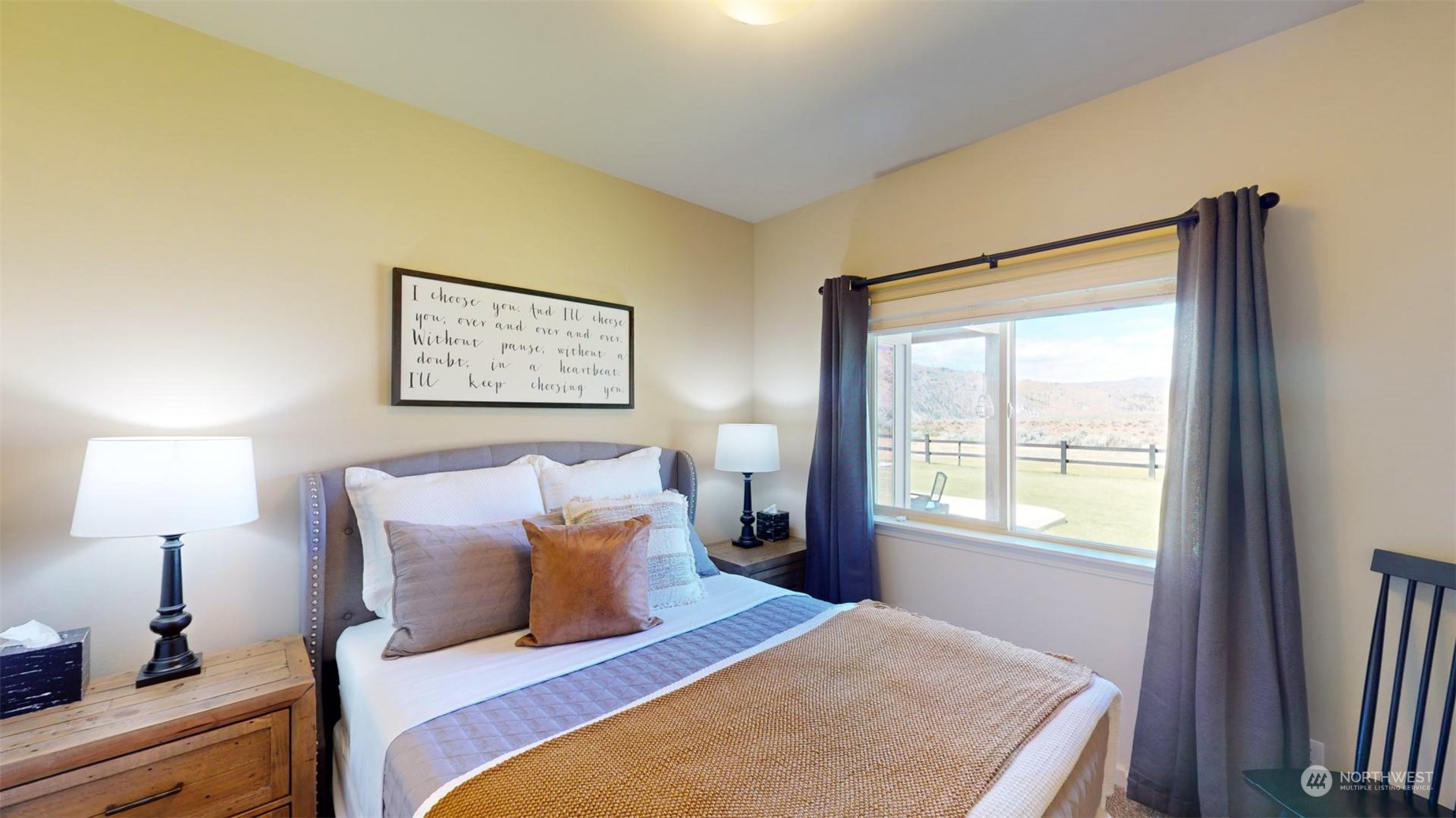 192 Hubbard Road Riverside, WA 98849 - Photo 19 of 40 a bedroom with a bed and a window