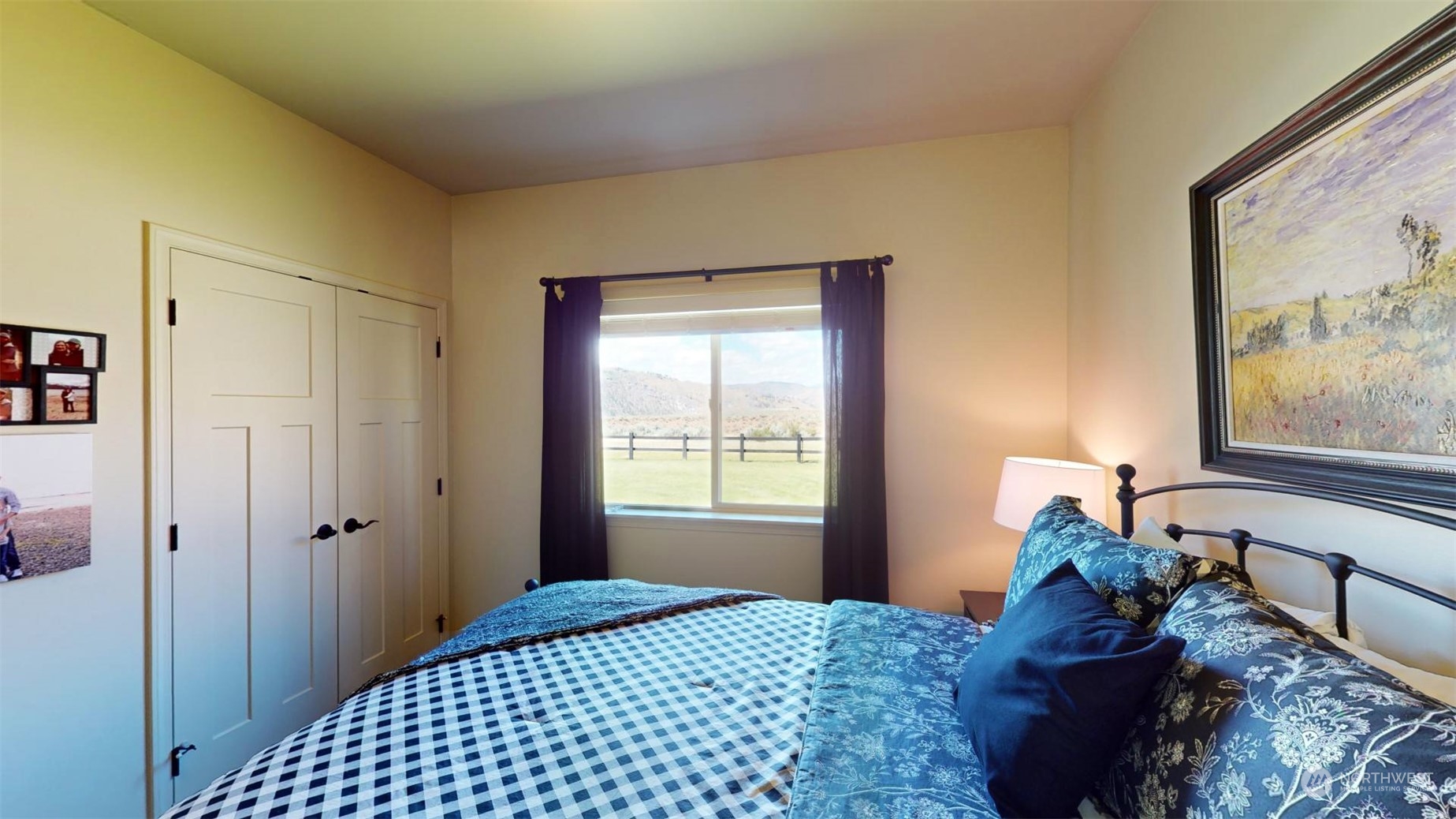 192 Hubbard Road Riverside, WA 98849 - Photo 21 of 40 a bed room with a bed and a window