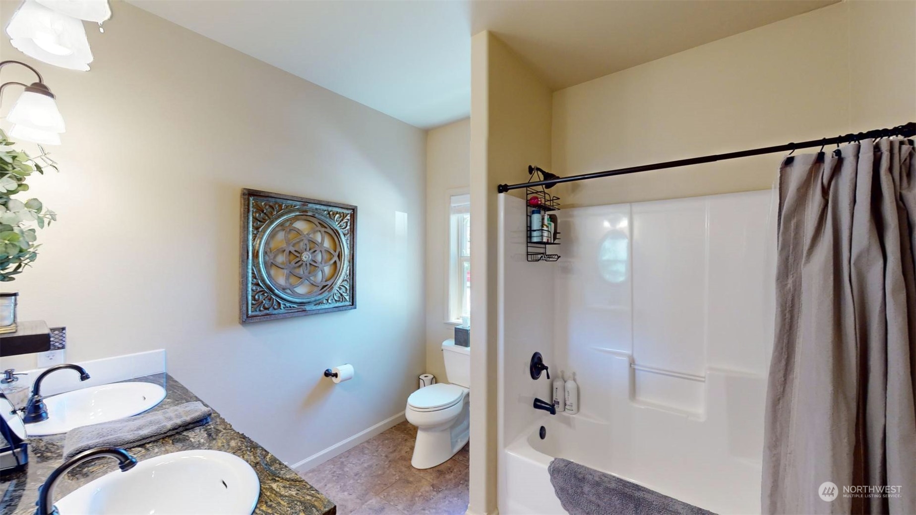 192 Hubbard Road Riverside, WA 98849 - Photo 23 of 40 a white toilet sitting next to a bathroom sink