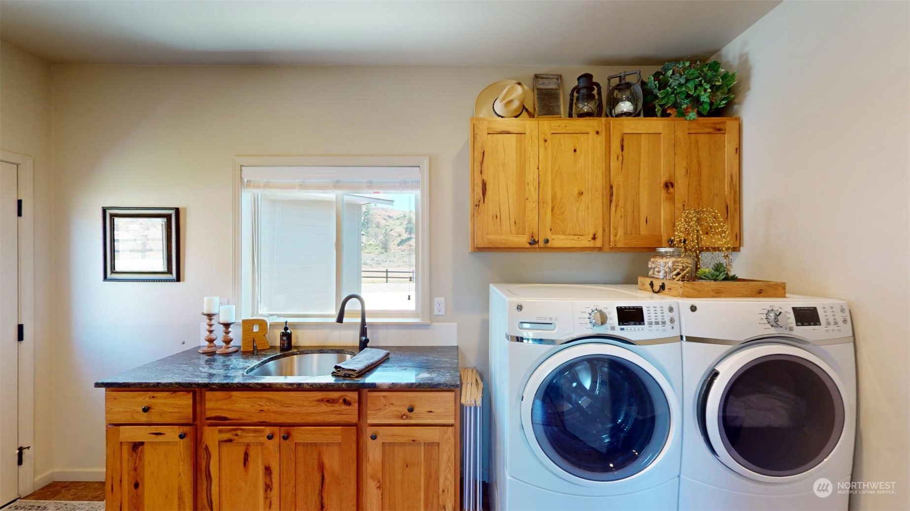 192 Hubbard Road Riverside, WA 98849 - Photo 25 of 40 a utility room with sink dryer and washer