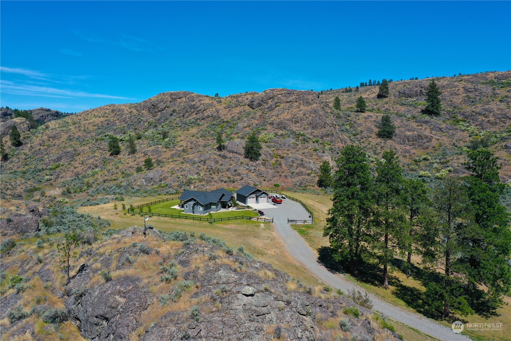 192 Hubbard Road Riverside, WA 98849 - Photo 32 of 40 a view of a mountain with a field