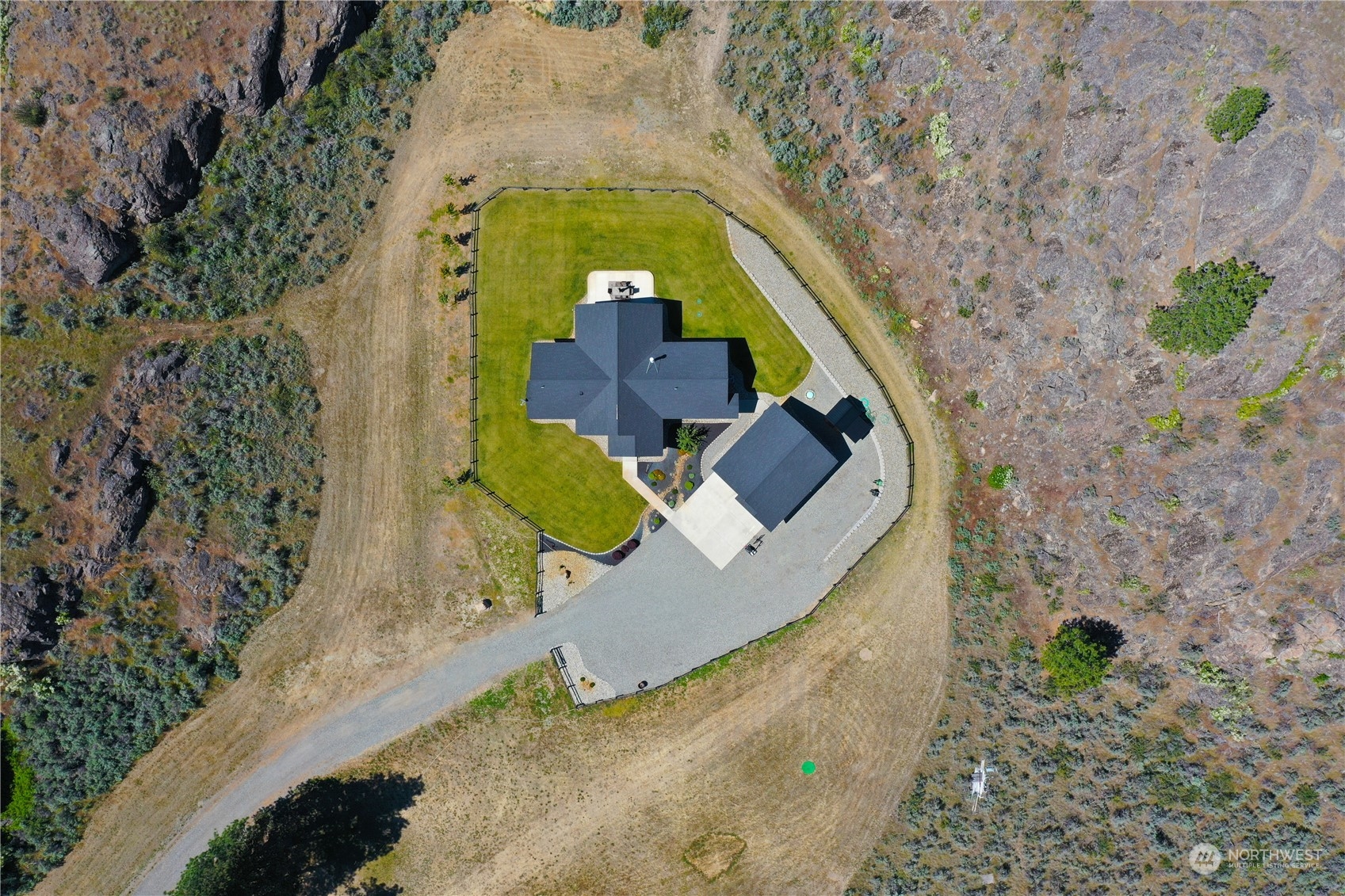 192 Hubbard Road Riverside, WA 98849 - Photo 39 of 40 a aerial view of a house with swimming pool