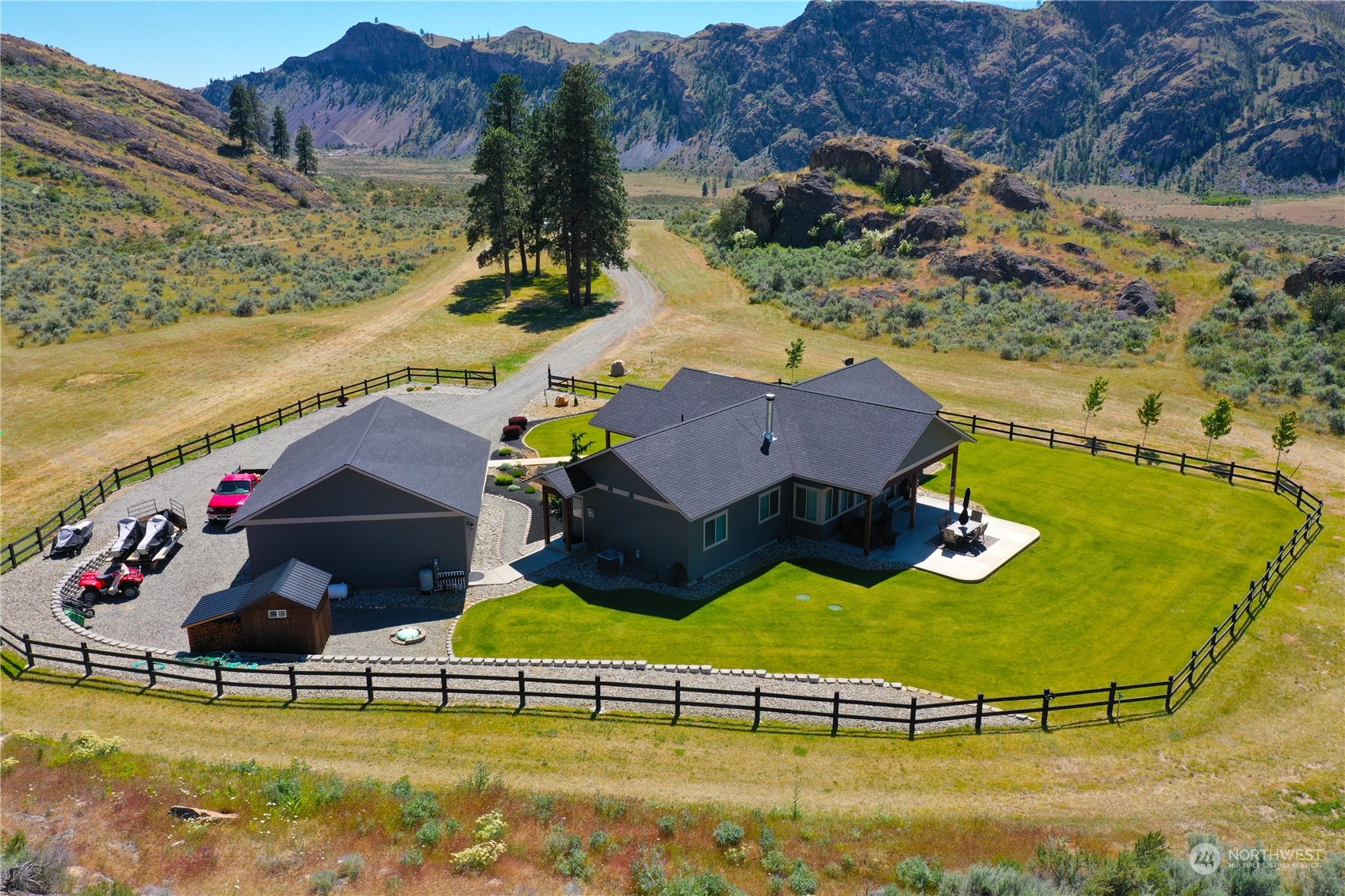 192 Hubbard Road Riverside, WA 98849 - Photo 6 of 40 an aerial view of residential houses with outdoor space