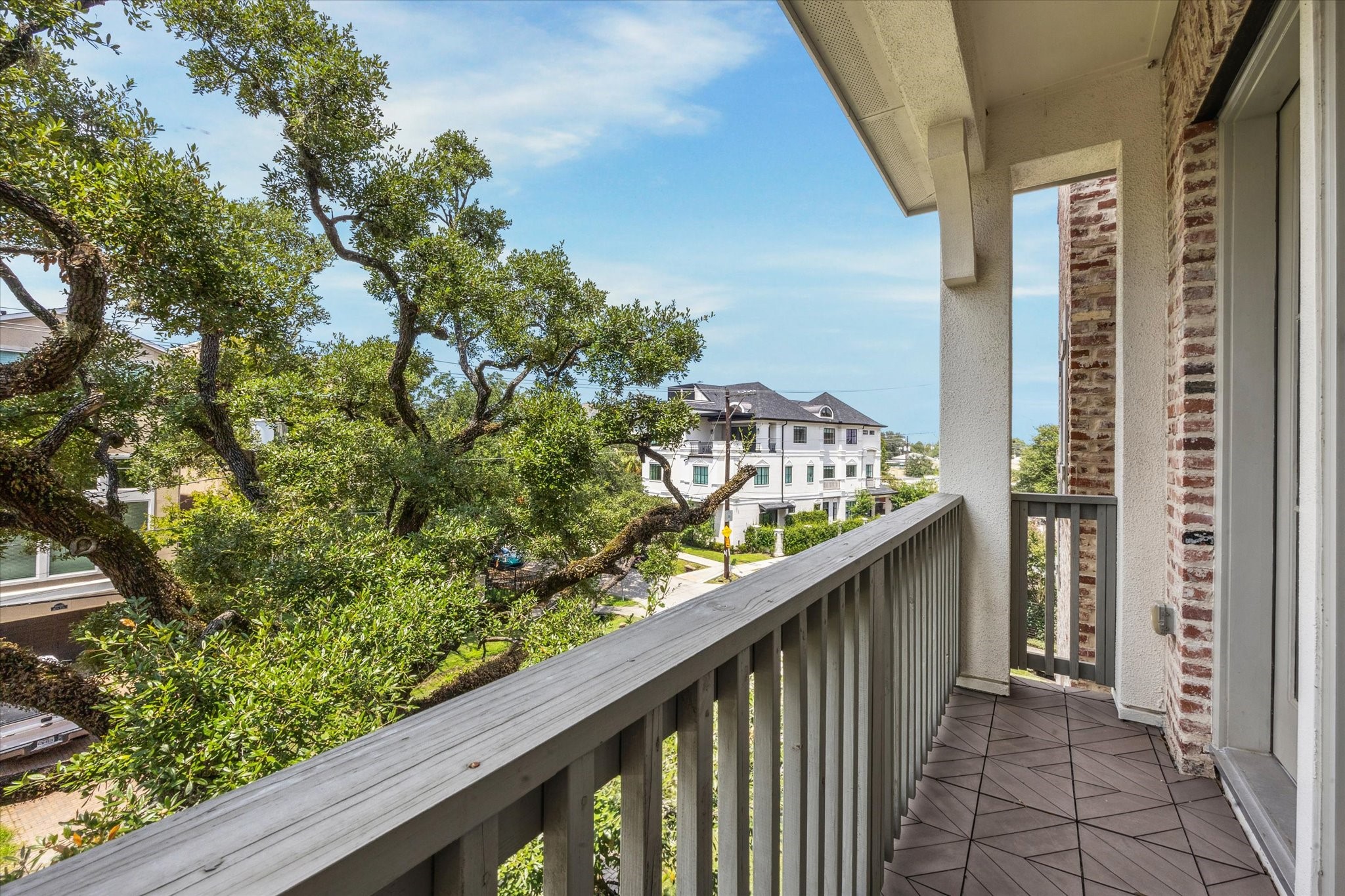 6331 Durford Street Houston, TX 77007 - Photo 21 of 37 Tree views from the balcony off the primary suite.