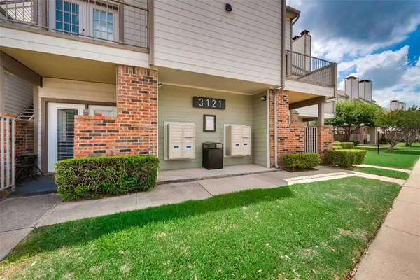 a swimming pool with outdoor seating and yard
