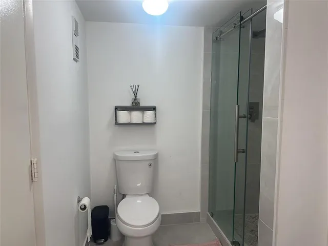 a bathroom with a toilet