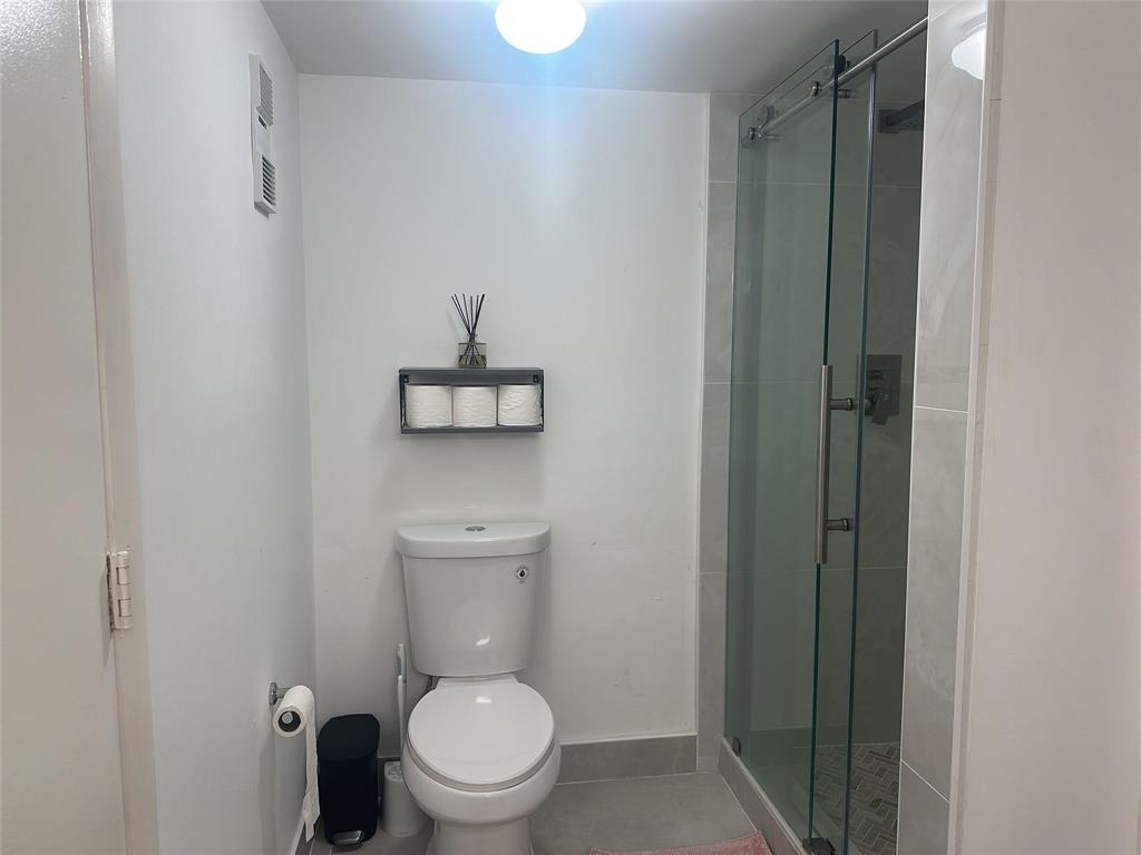 9682 West McNab Road, Unit 9682 Tamarac, FL 33321 - Photo 11 of 22 a bathroom with a toilet