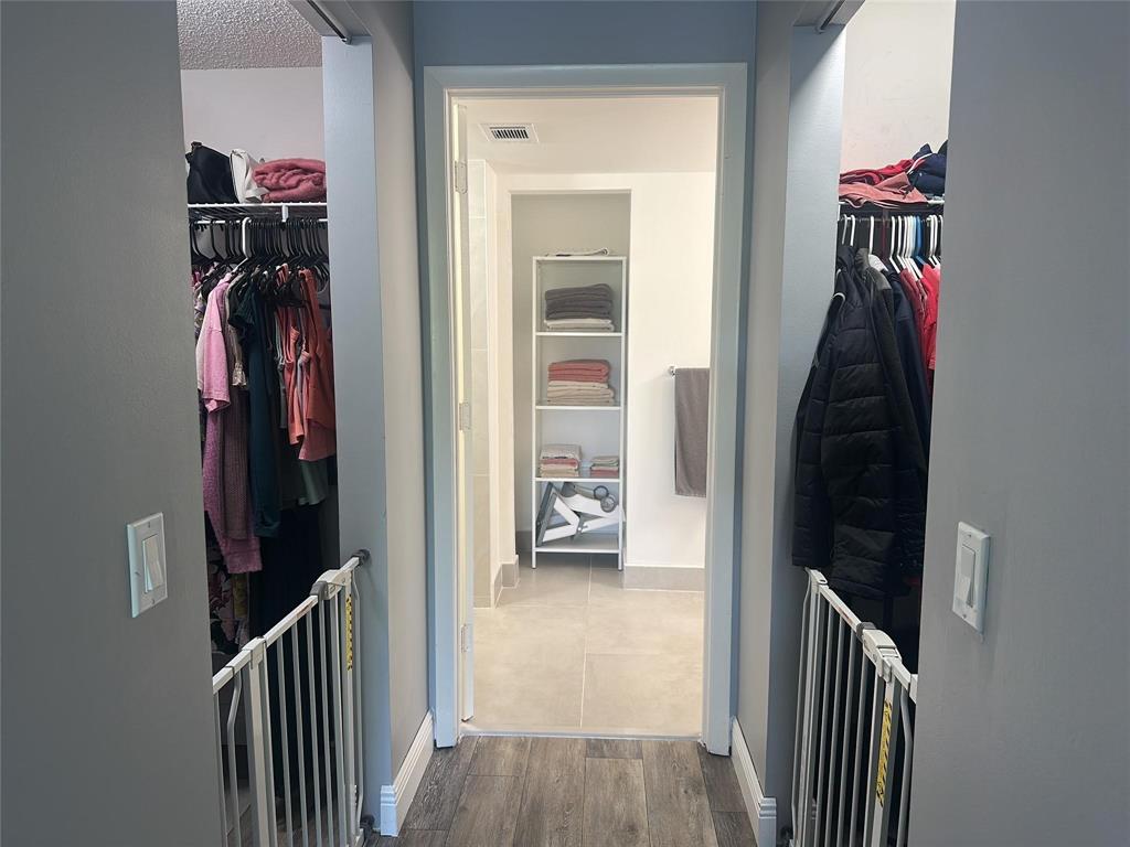 9682 West McNab Road, Unit 9682 Tamarac, FL 33321 - Photo 12 of 22 a view of a hallway with a flower pot