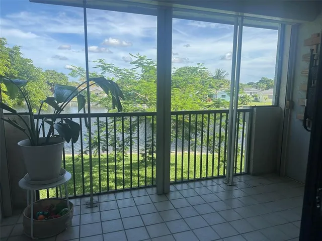 a view of a porch with furniture
