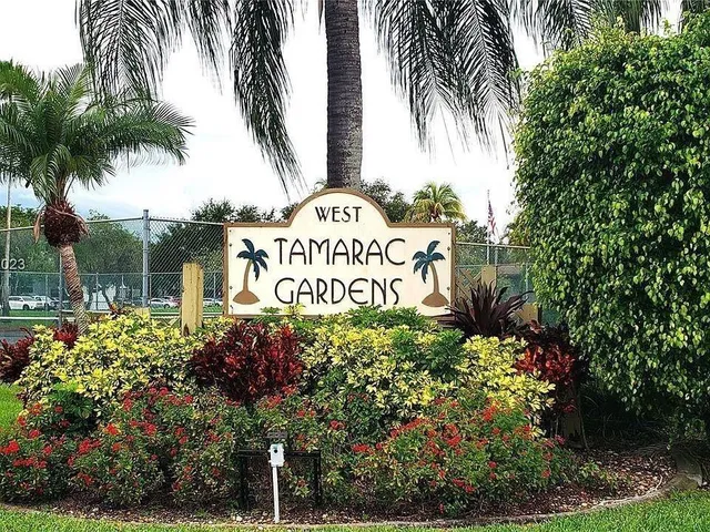 a sign on the side of the road