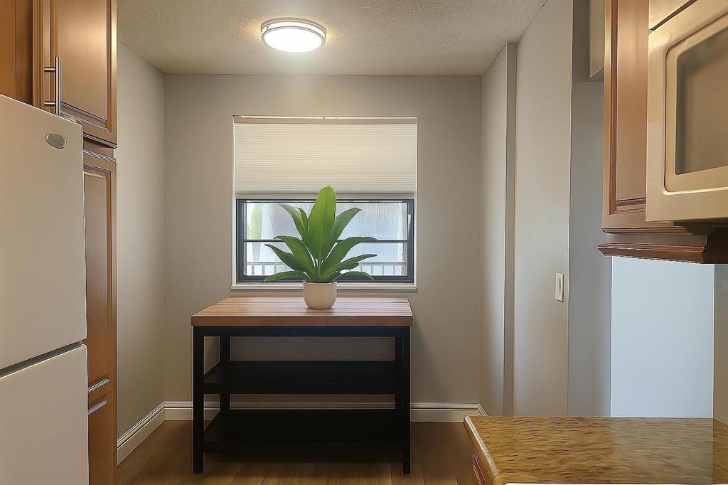 9682 West McNab Road, Unit 9682 Tamarac, FL 33321 - Photo 6 of 22 a view of livingroom with furniture