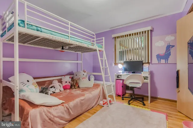 a room with lots of chairs and mirrors