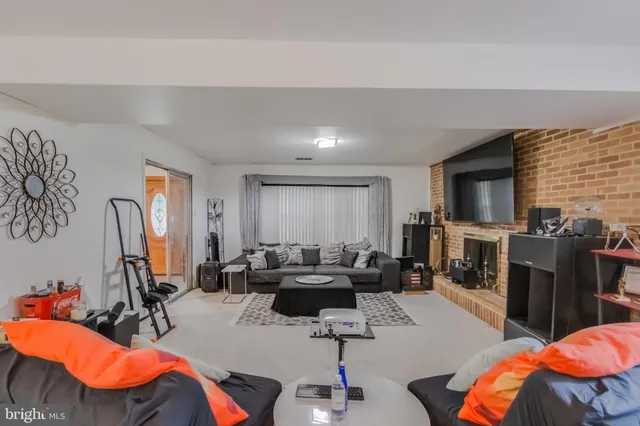 a bedroom with a bed and a furniture