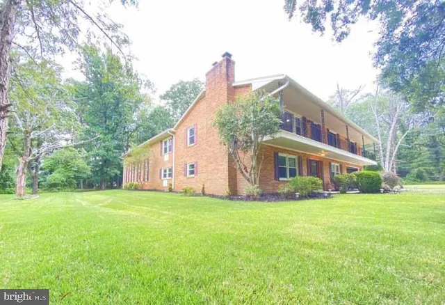 a view of a backyard with a garden