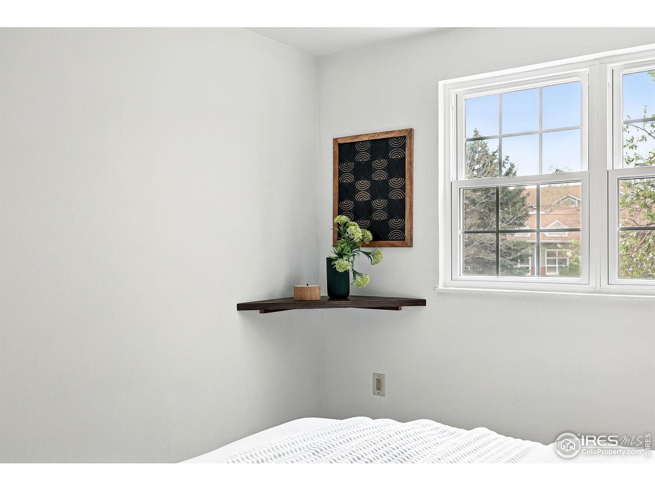3390 34th Street, Unit B Boulder, CO 80301 - Photo 17 of 31 a view of a window in an empty room