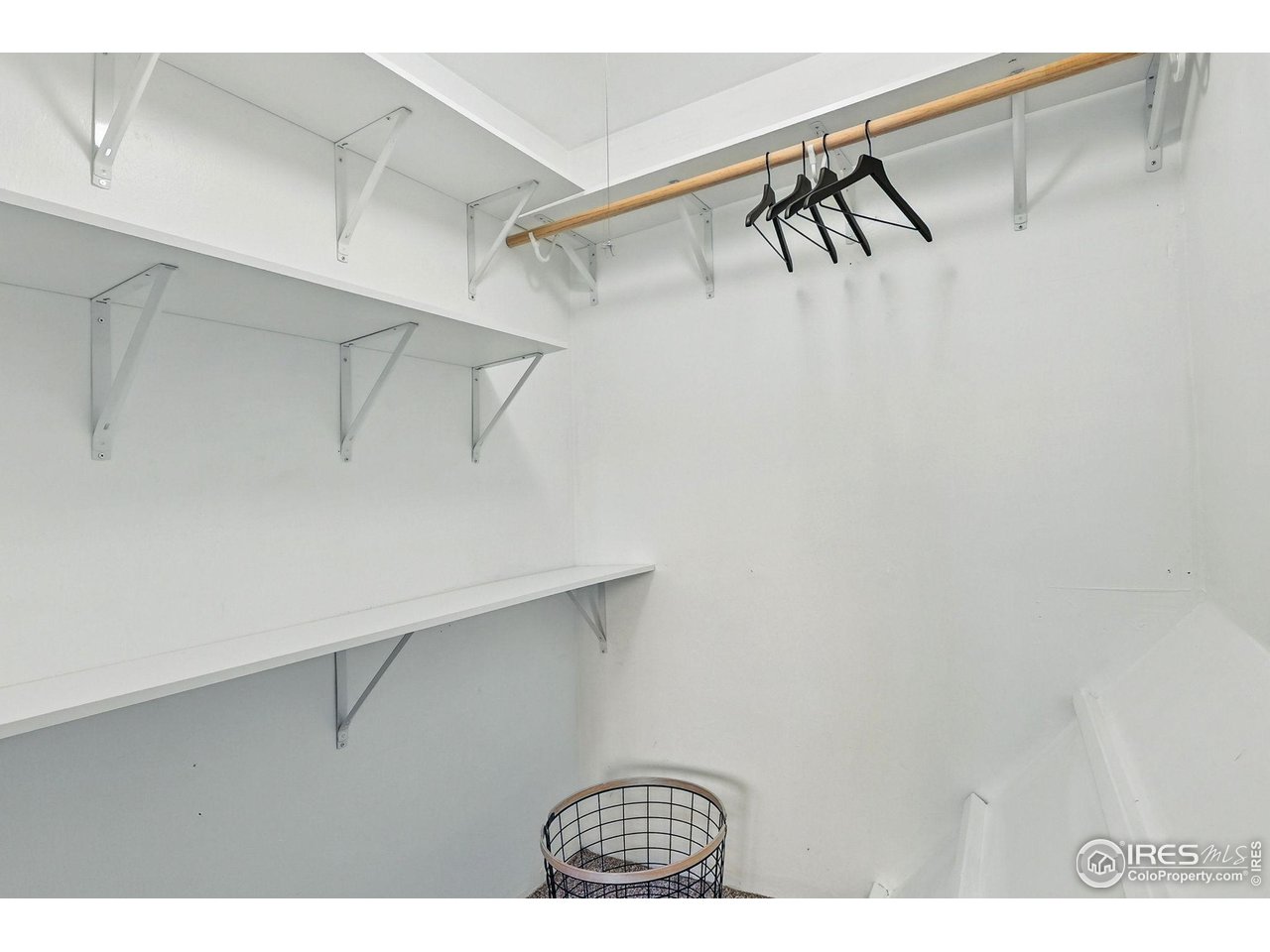 3390 34th Street, Unit B Boulder, CO 80301 - Photo 18 of 31 a view of walk in closet with clothes and shoes