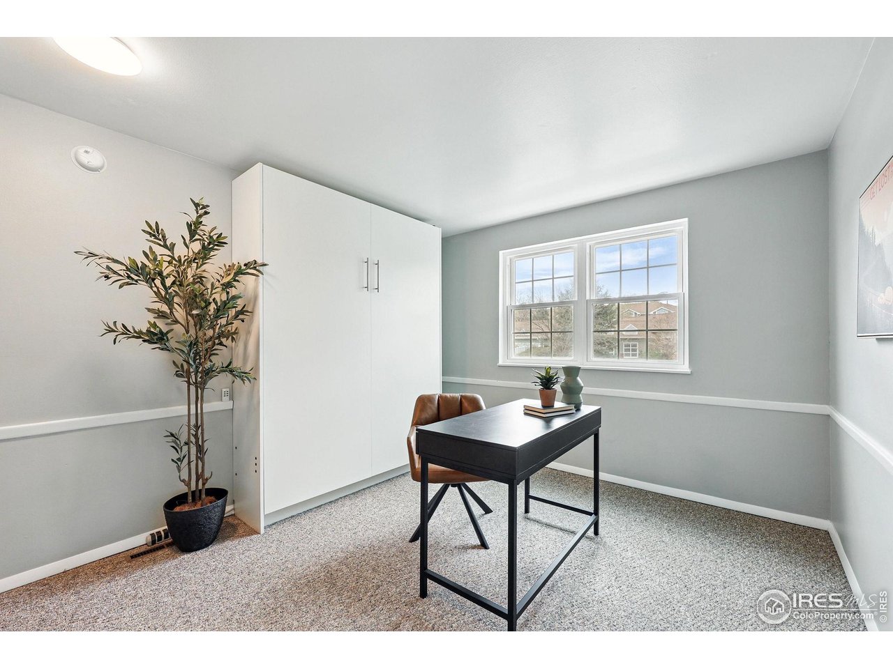 3390 34th Street, Unit B Boulder, CO 80301 - Photo 19 of 31 a workspace with furniture and a window