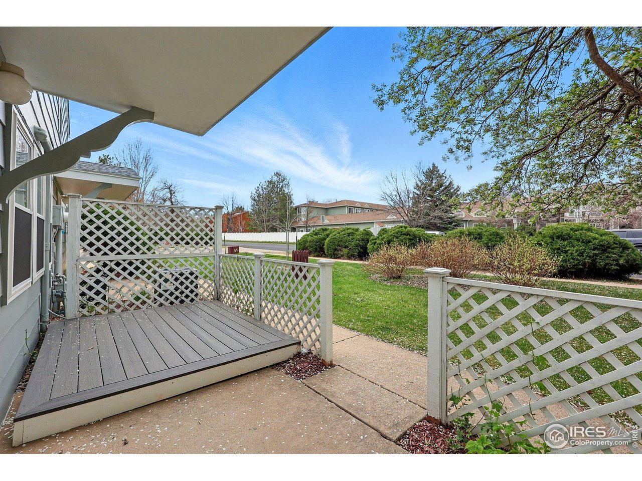 3390 34th Street, Unit B Boulder, CO 80301 - Photo 3 of 31 a view of a wooden deck with a yard
