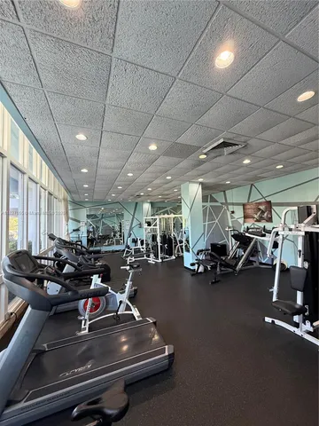 a view of an empty room with furniture