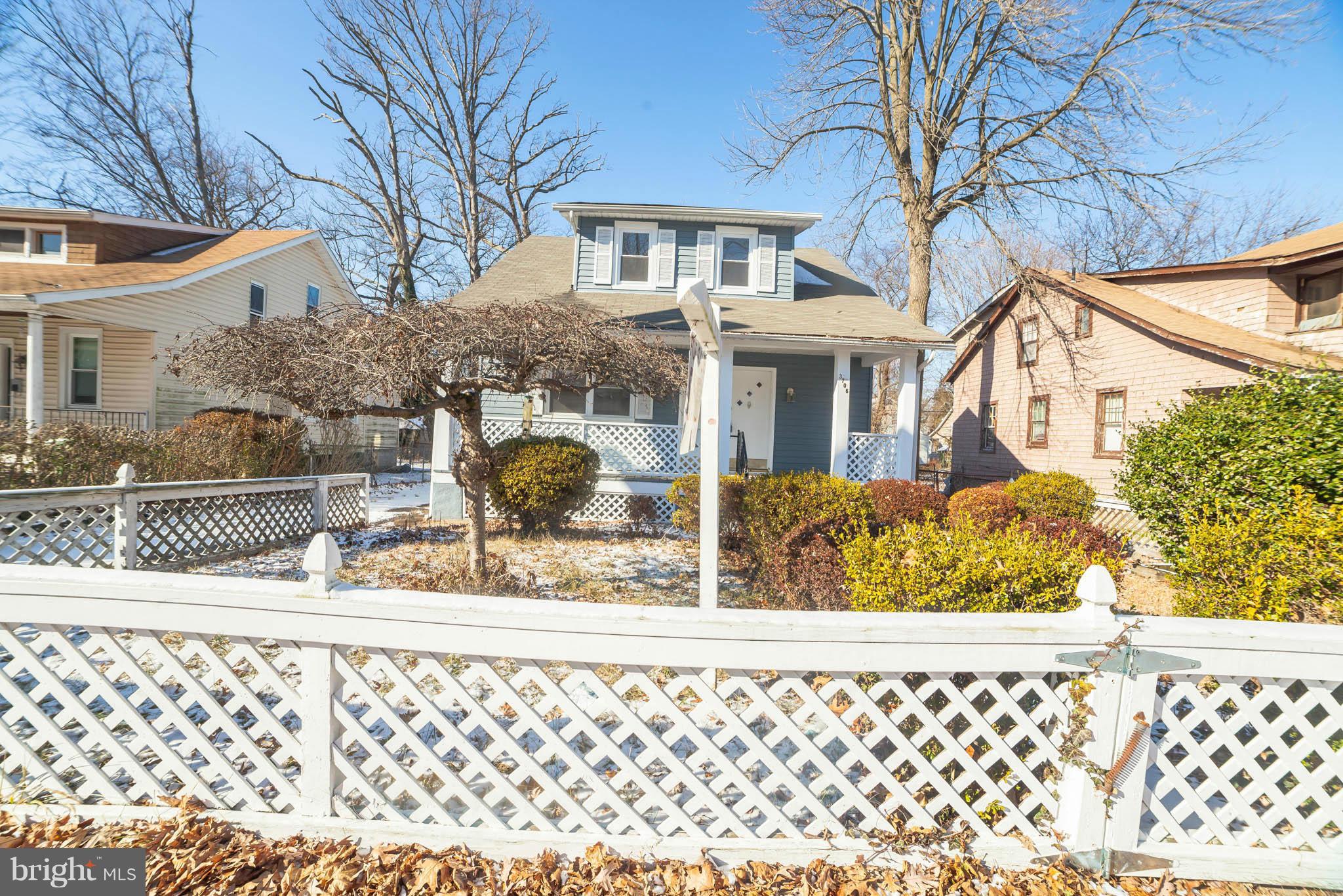 3706 Ferndale Avenue Baltimore, MD 21207 - Photo 2 of 27 front view of a house with a street