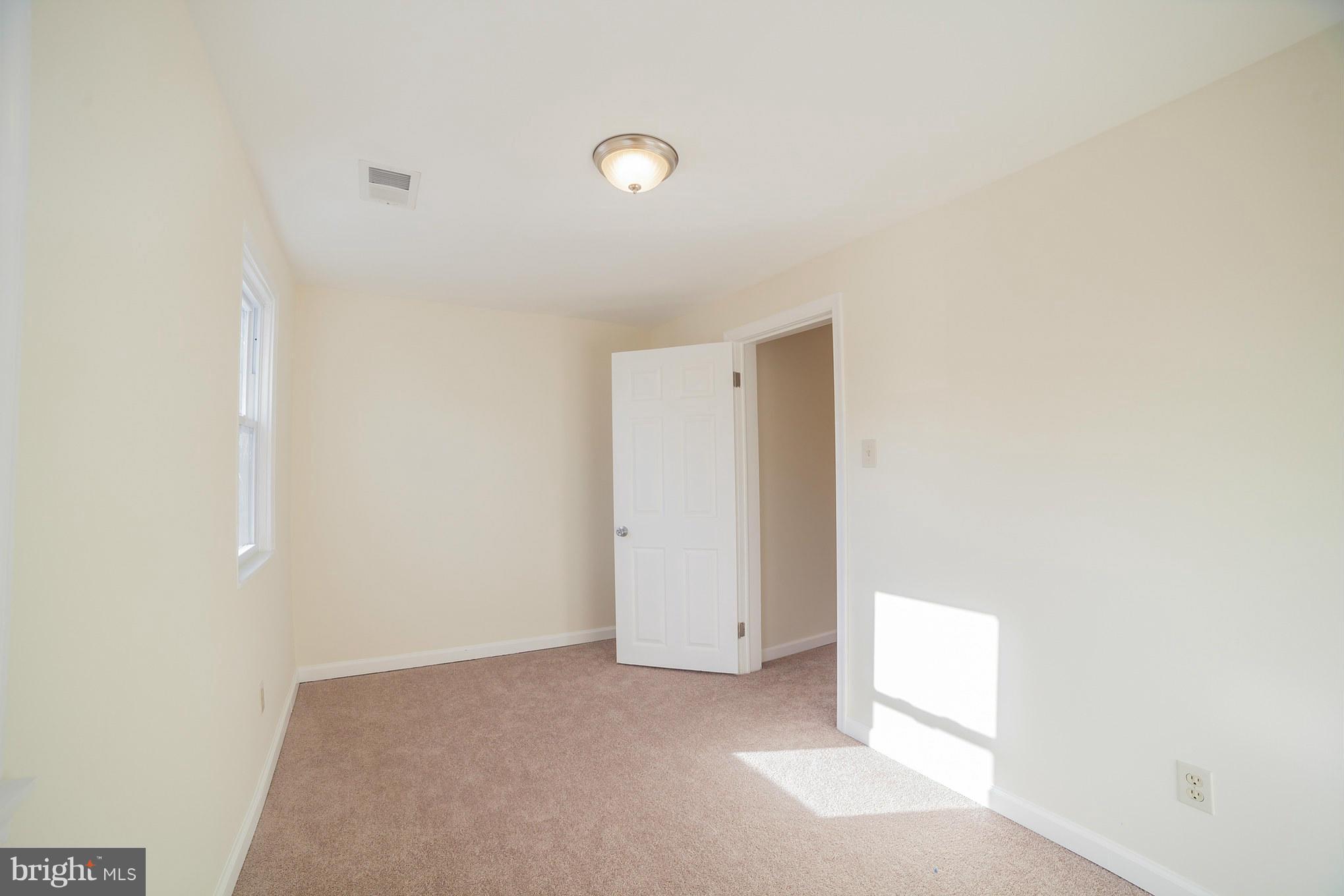 3706 Ferndale Avenue Baltimore, MD 21207 - Photo 22 of 27 a view of an empty room
