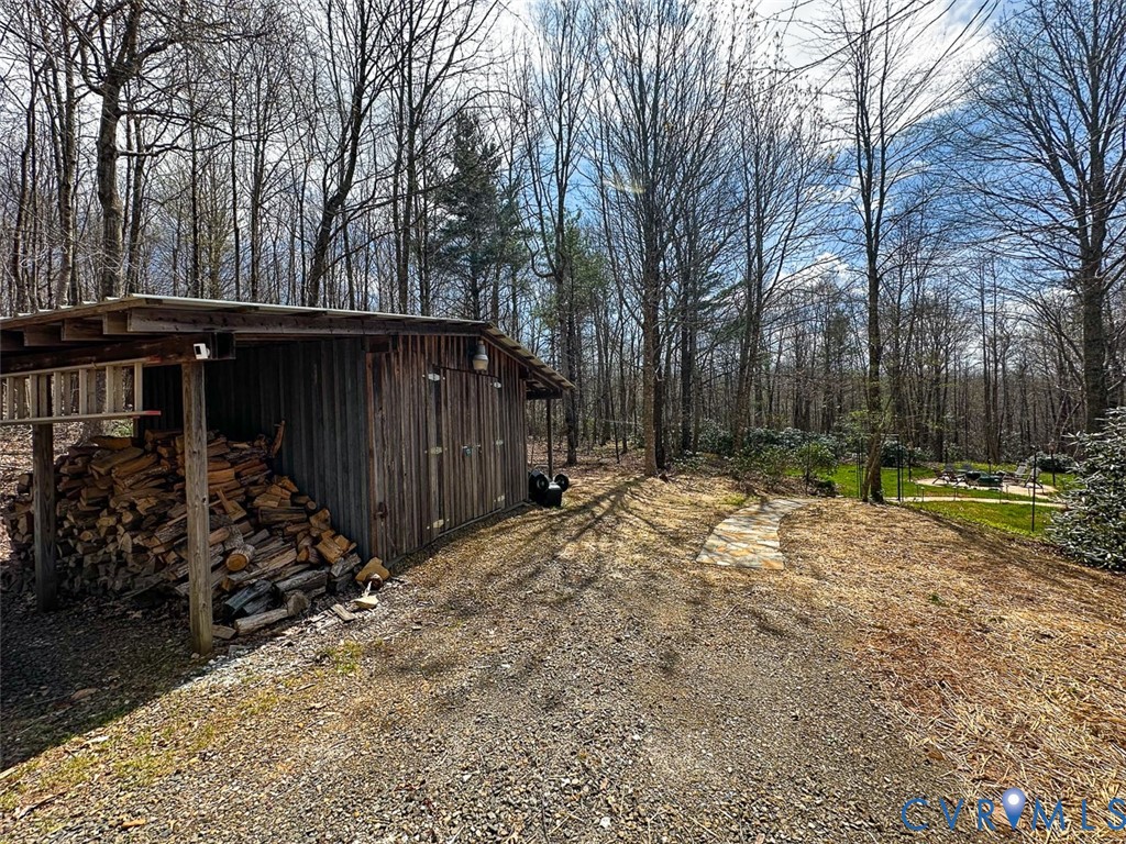 311 Dan River Road Meadows Of Dan, VA 24120 - Photo 11 of 50 a view of a backyard of the house