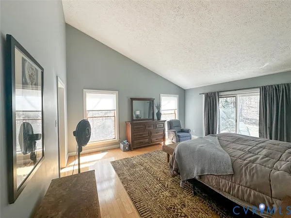 a bed room with a bed and a couch
