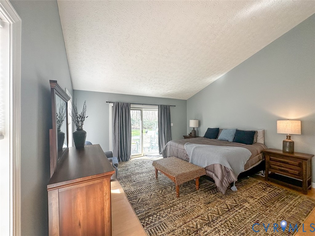 311 Dan River Road Meadows Of Dan, VA 24120 - Photo 23 of 50 a bed room with a bed and a couch