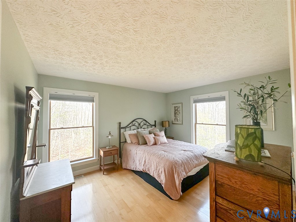 311 Dan River Road Meadows Of Dan, VA 24120 - Photo 31 of 50 a bedroom with a large bed and a window