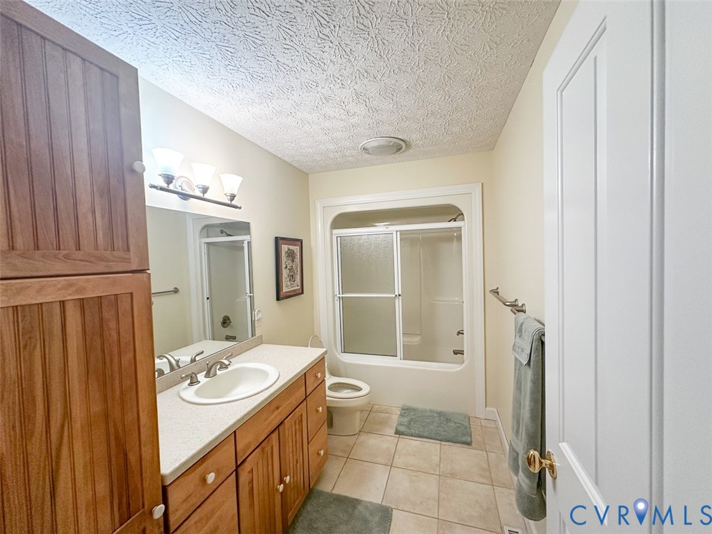 311 Dan River Road Meadows Of Dan, VA 24120 - Photo 35 of 50 a bathroom with a sink a toilet and shower