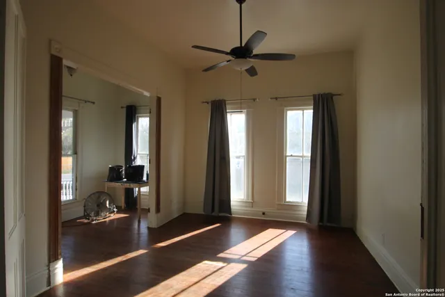 a kitchen with a sink a refrigerator and washer