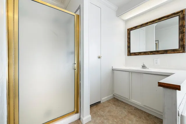a view of a bathroom with a glass door
