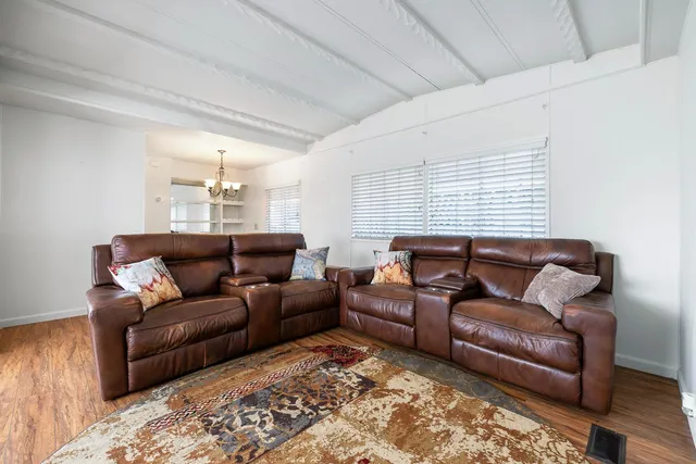 a living room with furniture and a couch