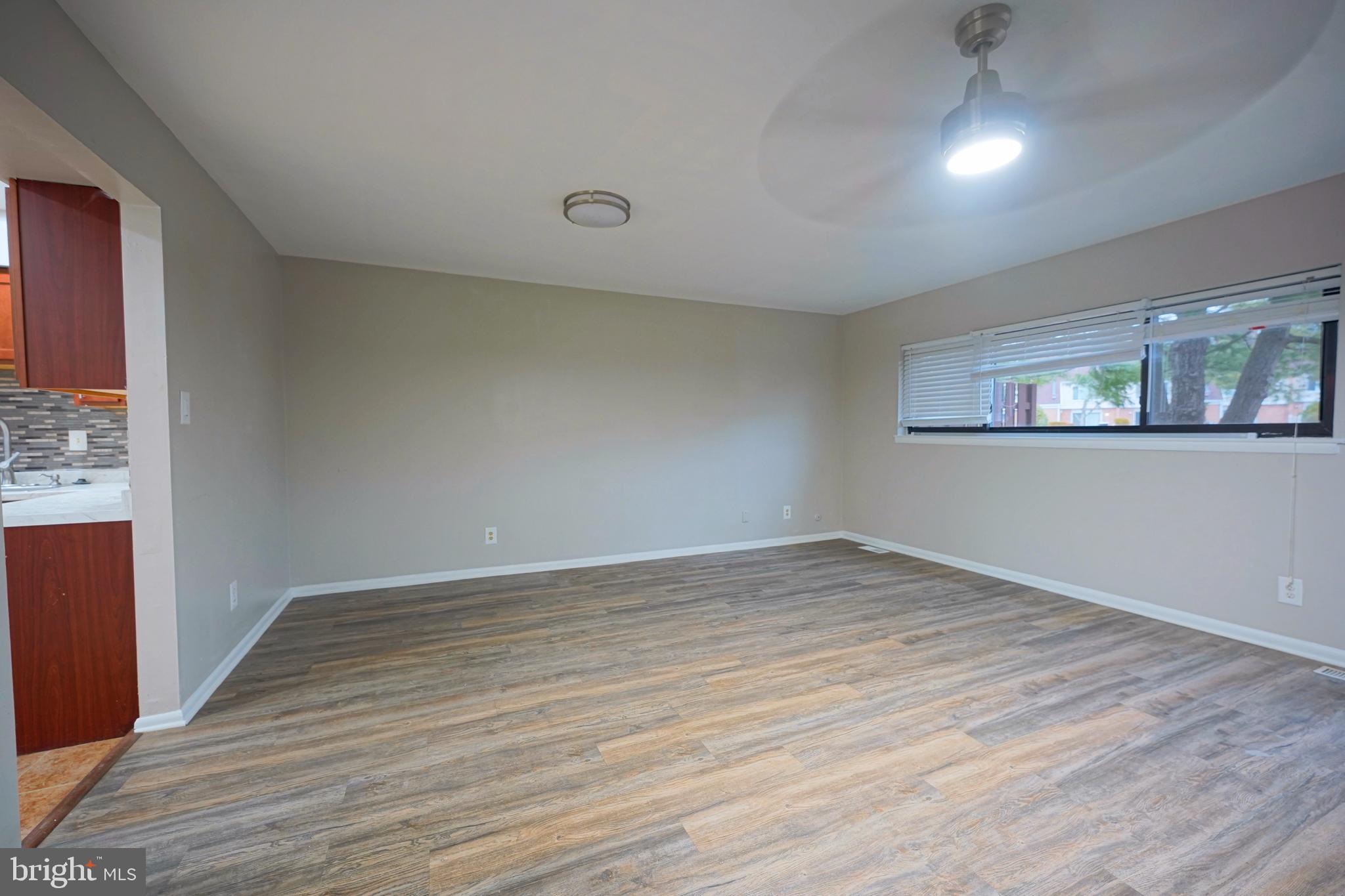 151 Echelon Road Voorhees, NJ 08043 - Photo 22 of 40 an empty room with wooden floor and windows