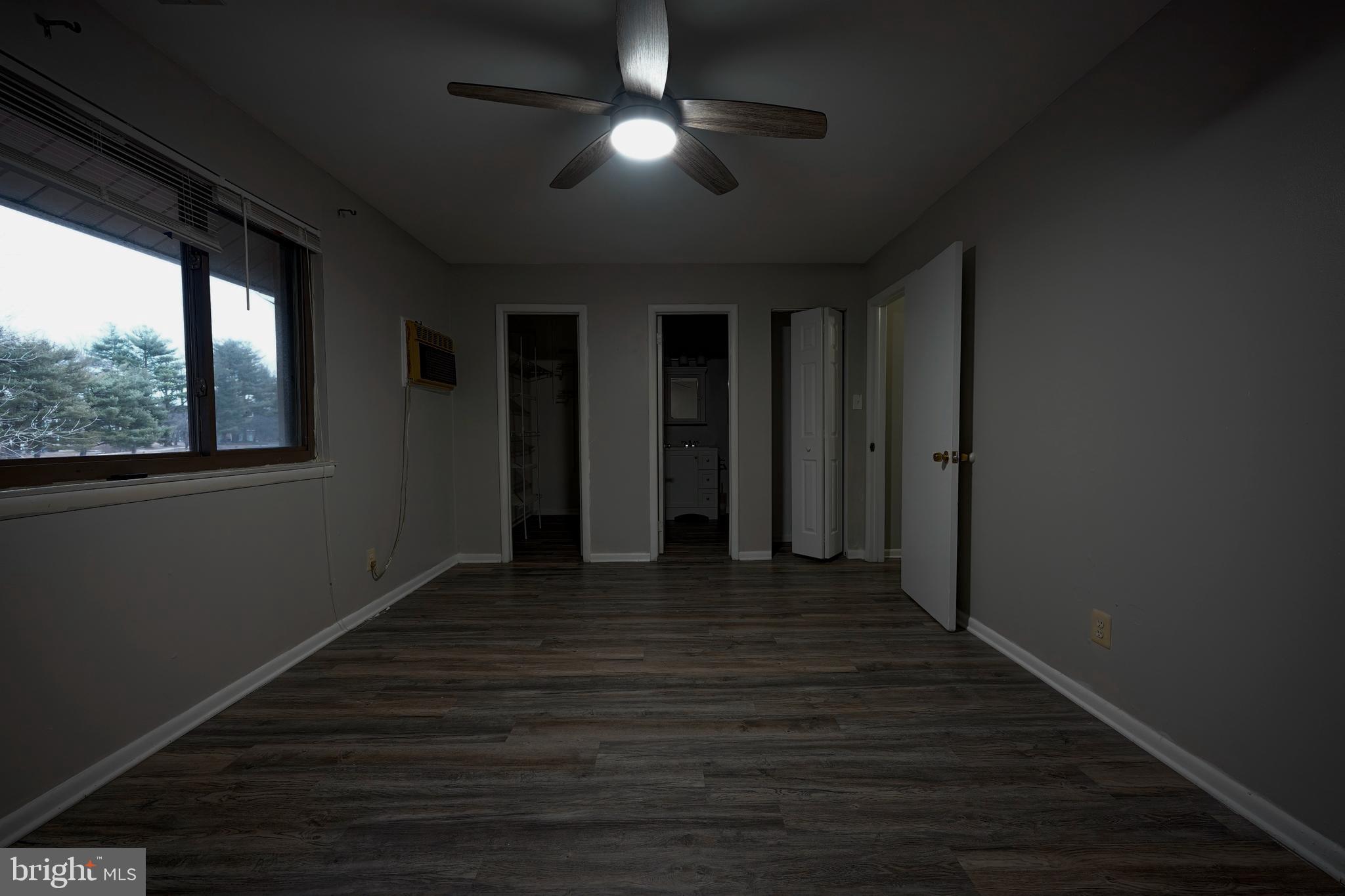 151 Echelon Road Voorhees, NJ 08043 - Photo 31 of 40 a view of empty room with wooden floor and fan