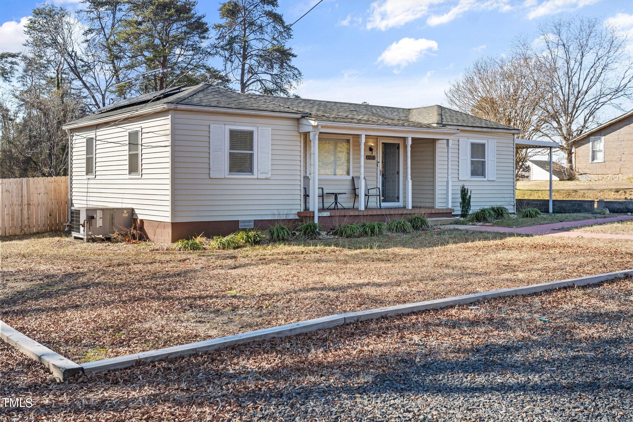9268 Highway 700 Ruffin, NC 27326 - Photo 3 of 32 a front view of a house with garden