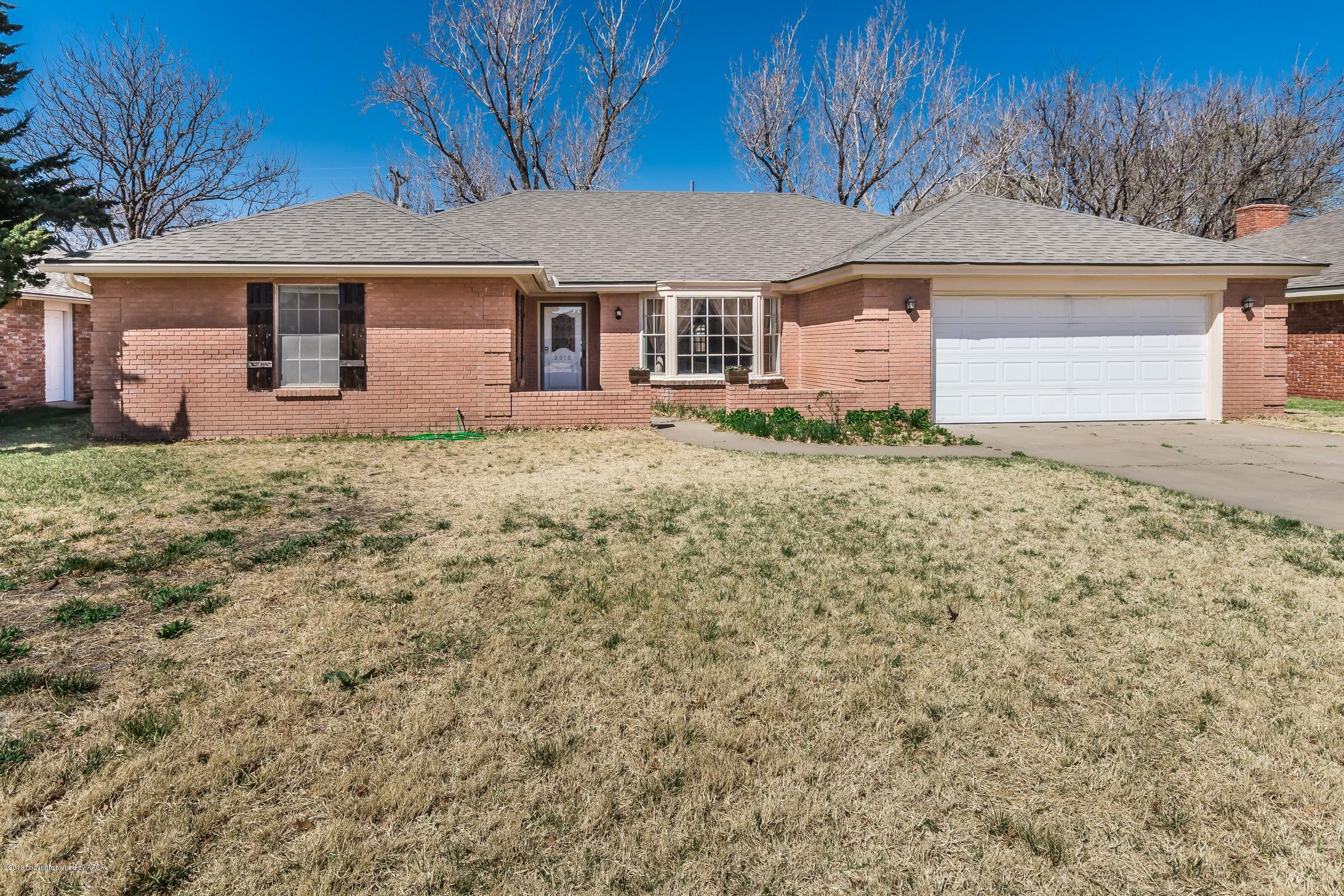 3312 Lombard Road Amarillo, TX 79106 - Photo 1 of 23 a front view of a house with garden