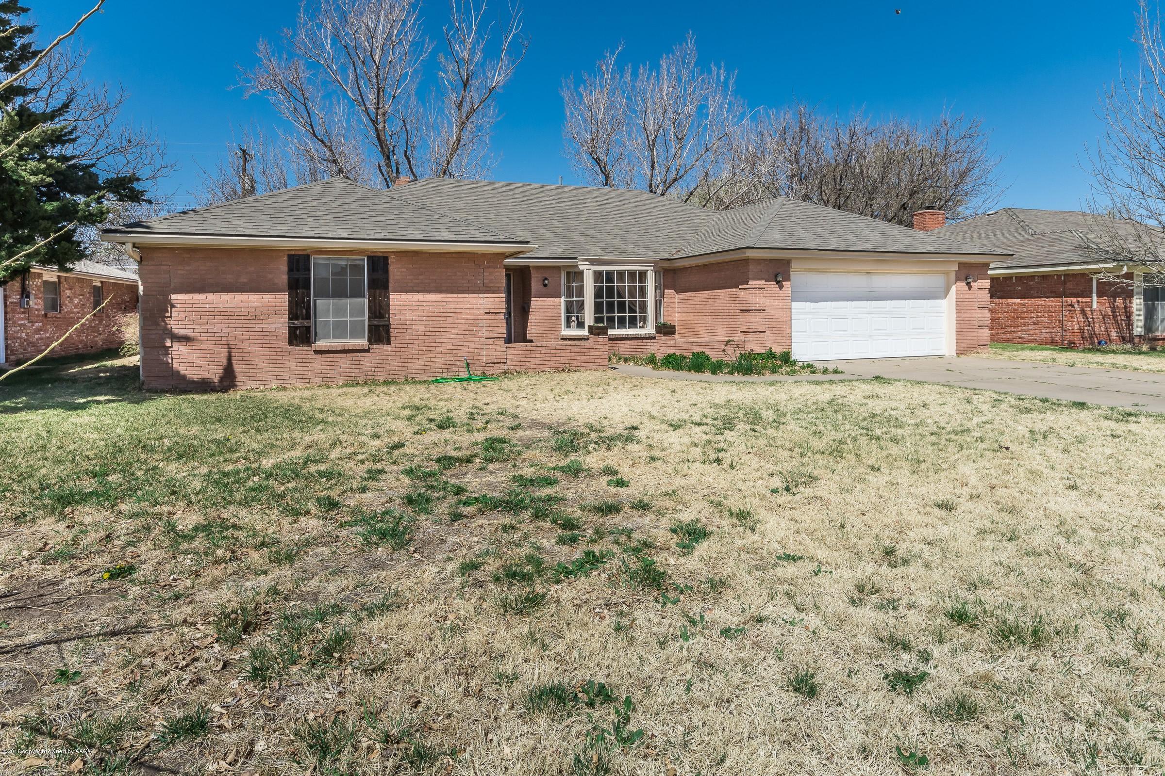 3312 Lombard Road Amarillo, TX 79106 - Photo 2 of 23 front view of a house with a yard