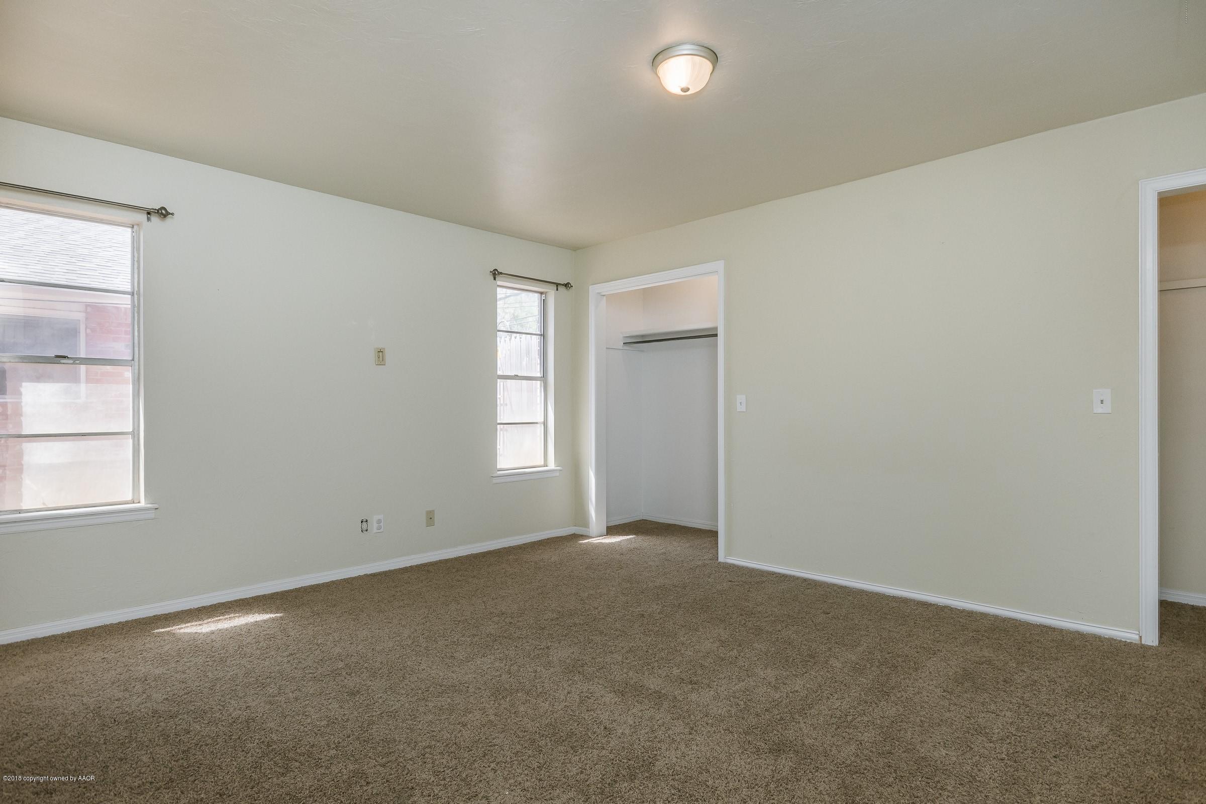3312 Lombard Road Amarillo, TX 79106 - Photo 14 of 23 an empty room with windows