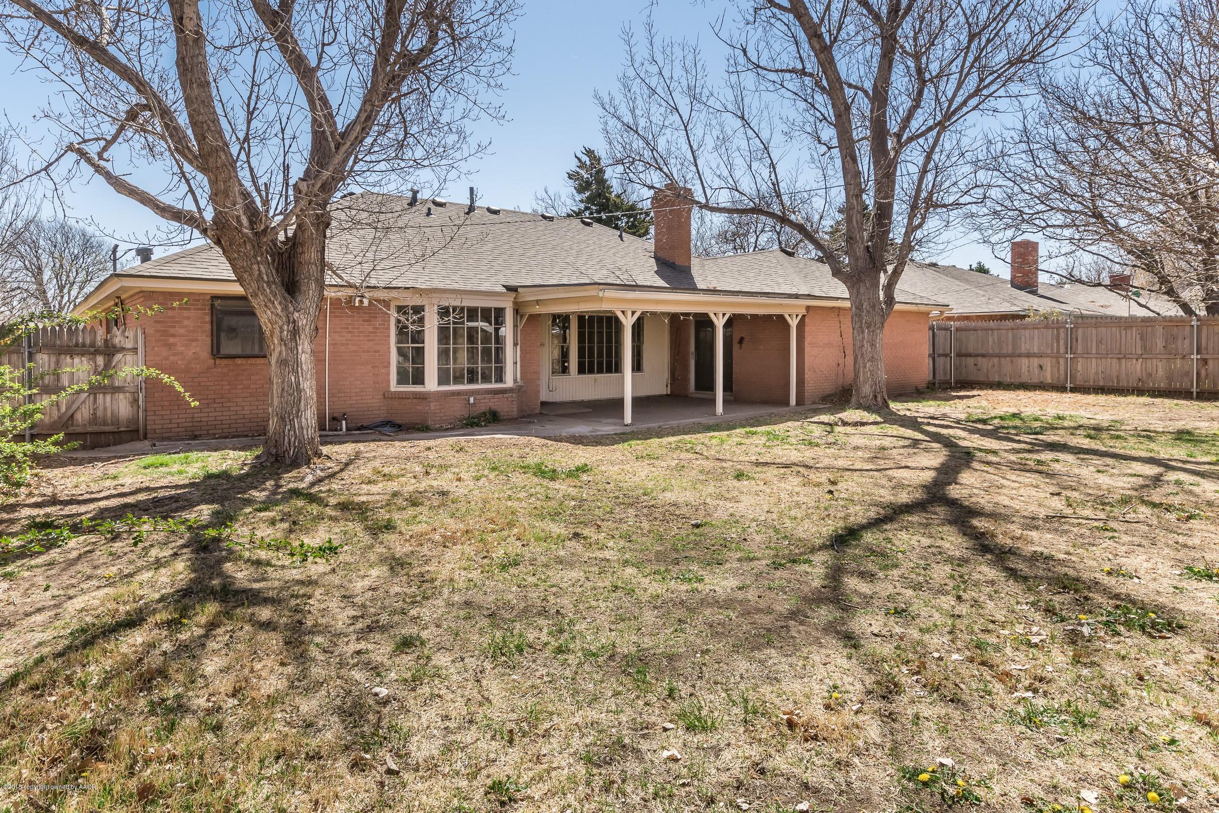 3312 Lombard Road Amarillo, TX 79106 - Photo 23 of 23 a front view of a house with a yard covered with snow