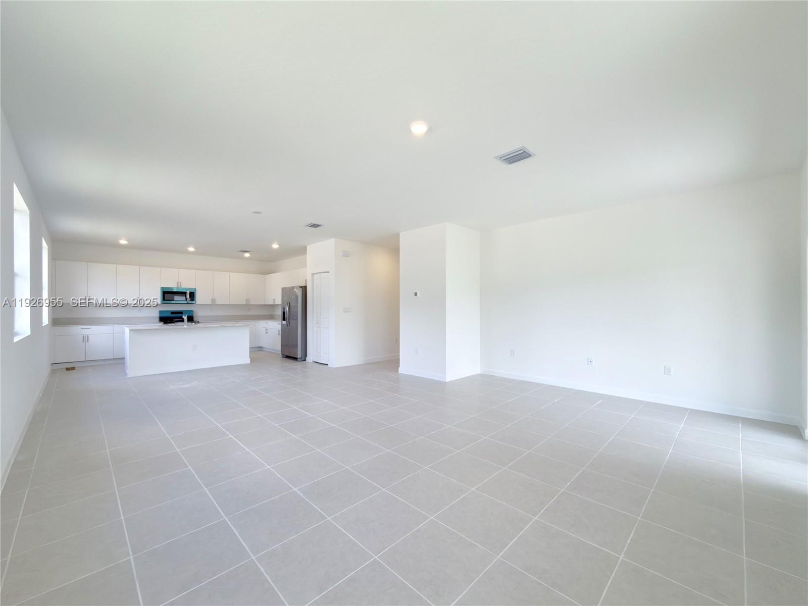 13202 Southwest 189th Terrace Miami, FL 33157 - Photo 13 of 34 a view of a kitchen with a sink and cabinets